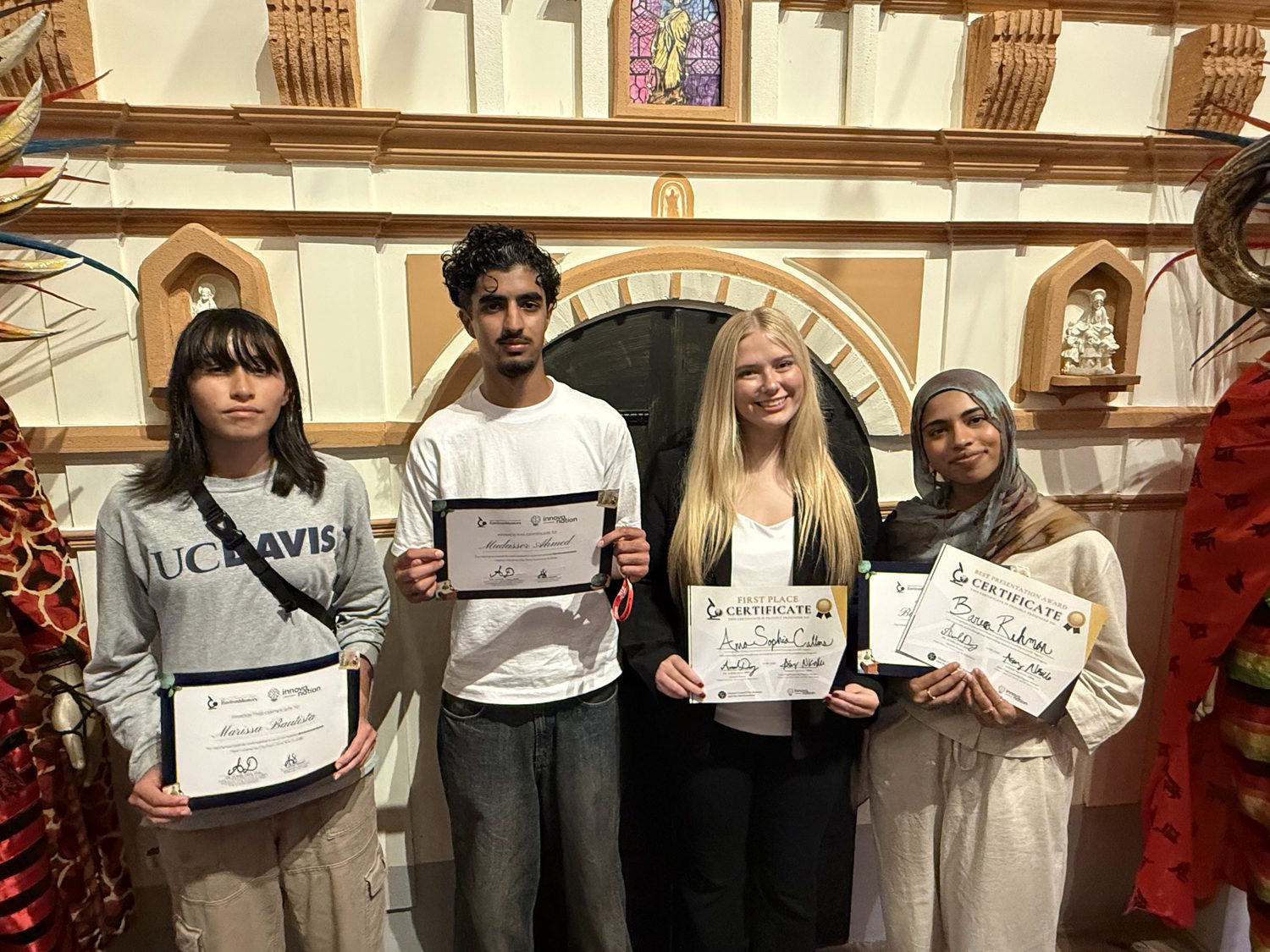 The four UC Davis EnvironMentors students with their certificates at the awards ceremony in Panama